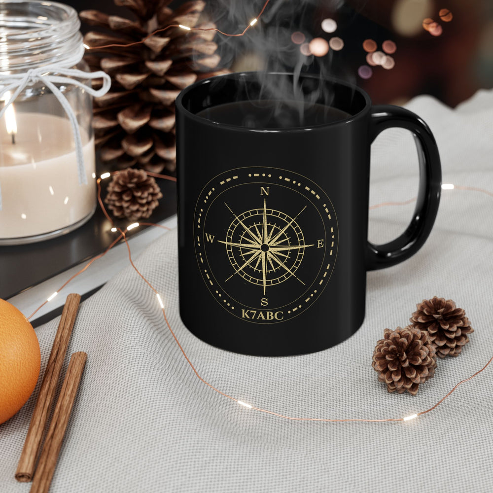 Close-up of a personalized amateur radio compass mug with custom callsign and authentic Morse code accents.