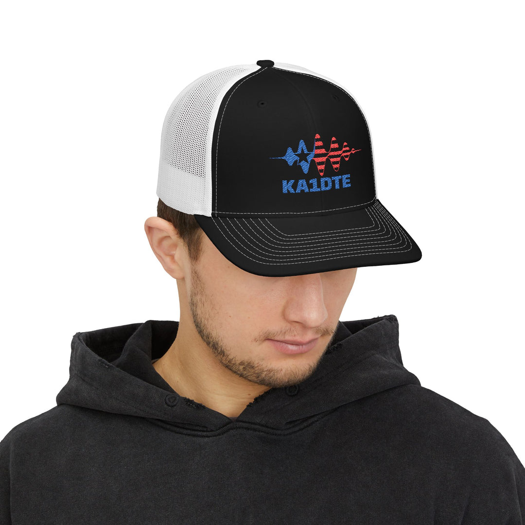 Model wearing personalized Richardson 112 embroidered ham radio hat with custom callsign.