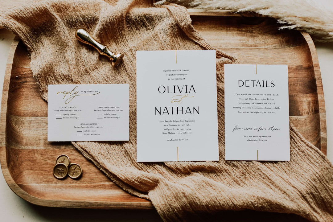 Modern Minimalist Wedding invitation set on a wooden tray with gold line