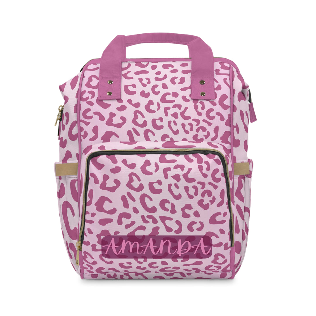 Side pocket view of the personalized pink diaper bag backpack