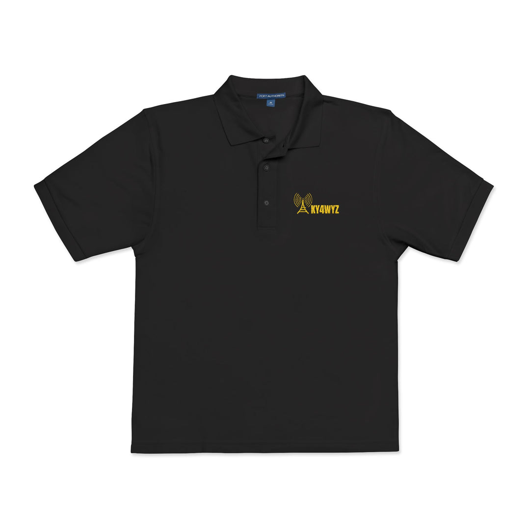 Personalized ham radio polo shirt embroidered with a custom amateur radio callsign and antenna design on a black Port Authority polo.