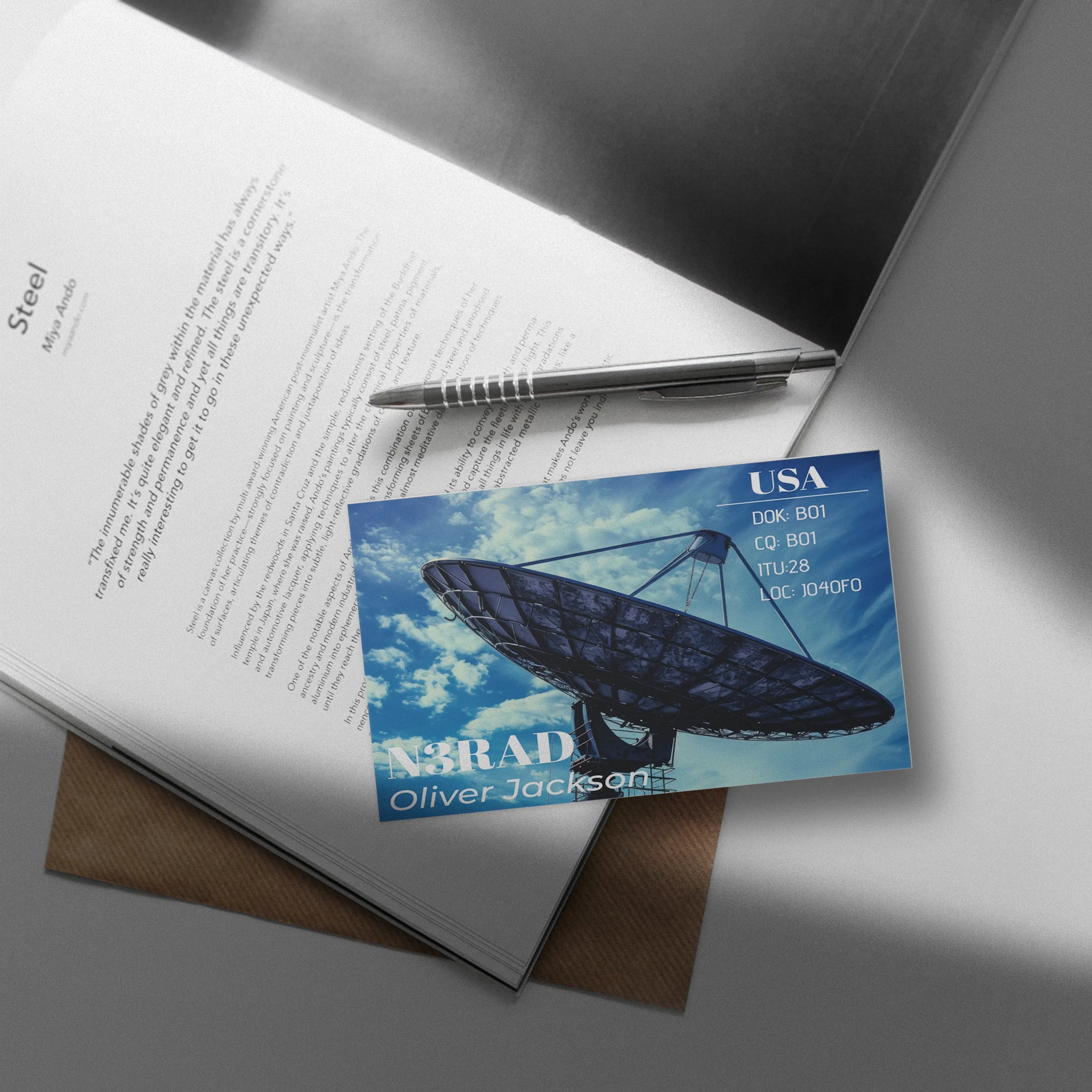 Personalized ham radio QSL cards featuring a custom callsign, operator information, and a modern satellite antenna design.