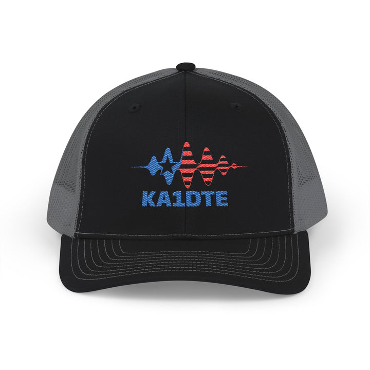 Personalized Richardson 112 ham radio hat with custom embroidered amateur radio callsign on black and charcoal trucker cap.