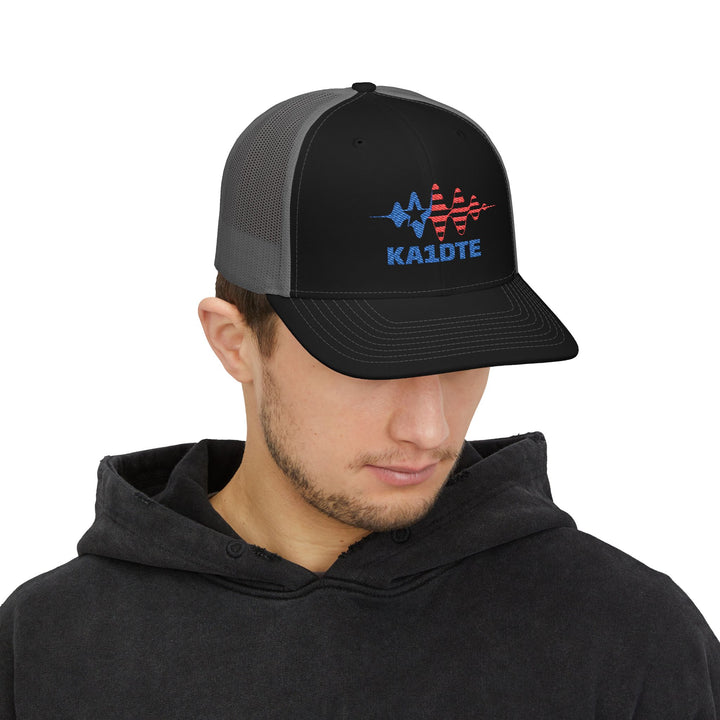 Model wearing personalized Richardson 112 embroidered ham radio hat with custom callsign - black-charcoal