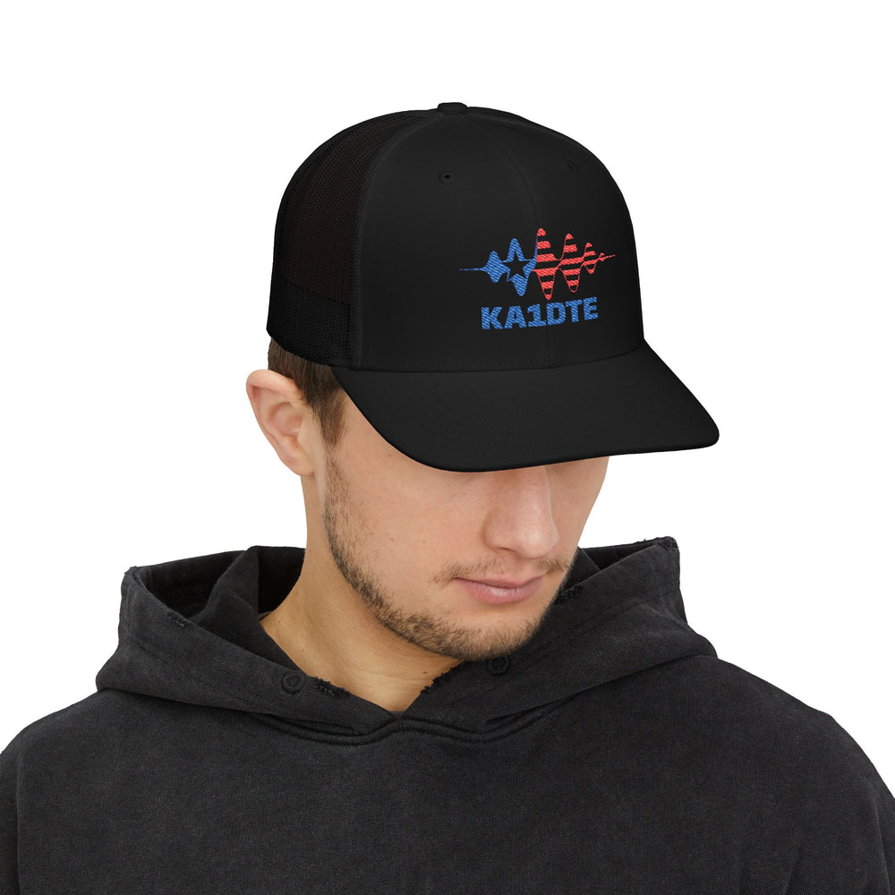 Model wearing personalized Richardson 112 embroidered ham radio hat with custom callsign - black