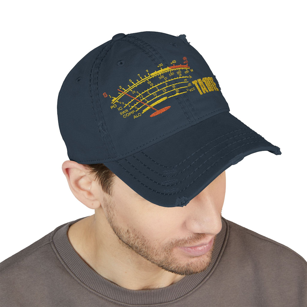 Side view of an embroidered distressed ham radio dad hat featuring a custom callsign and vintage low-profile design - navy color on model